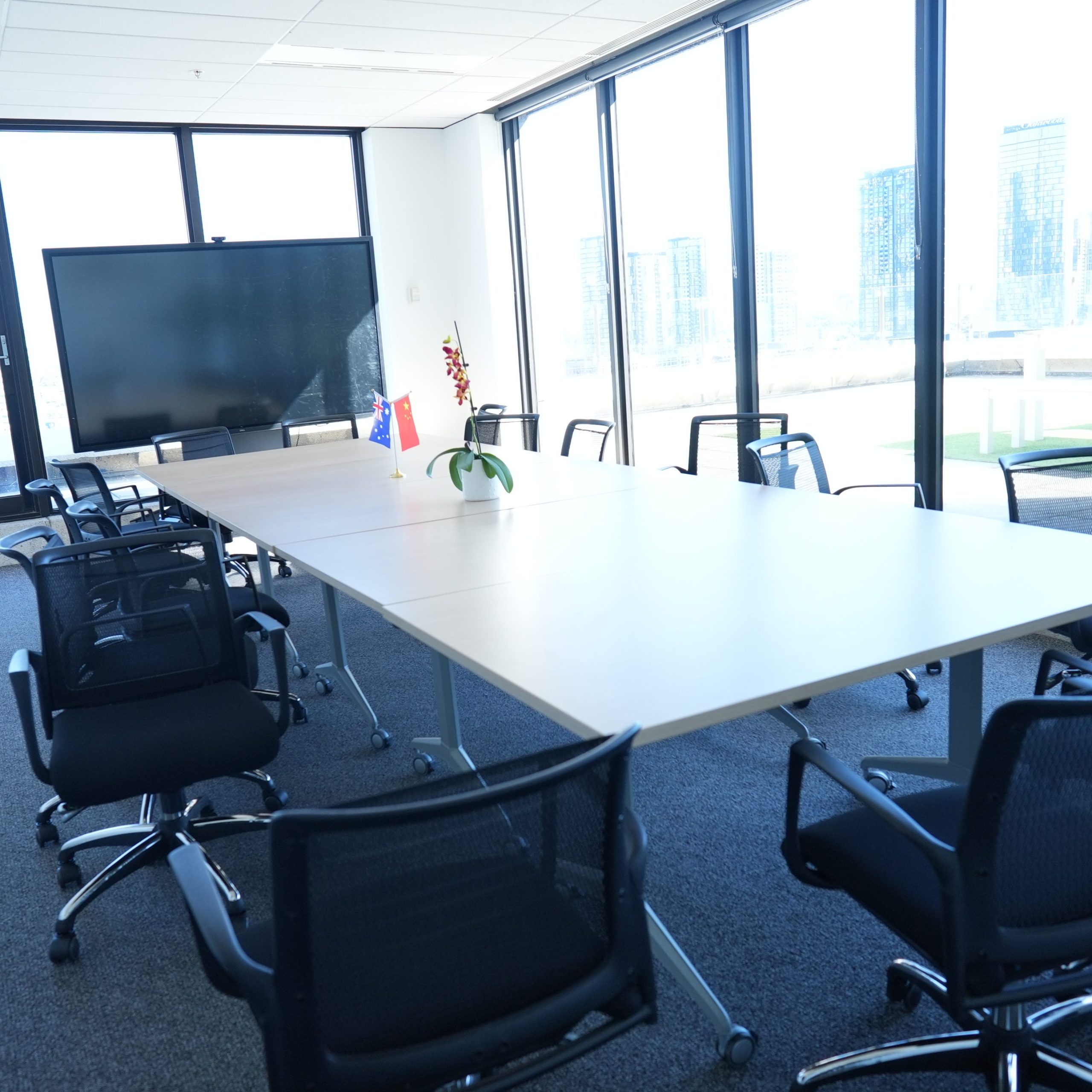 Large meeting room within Melbourne office space with city views